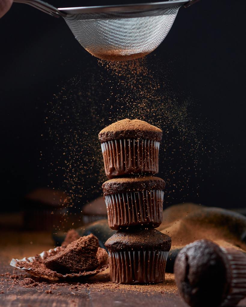 chocolate cupcake with cocoa powder dusting