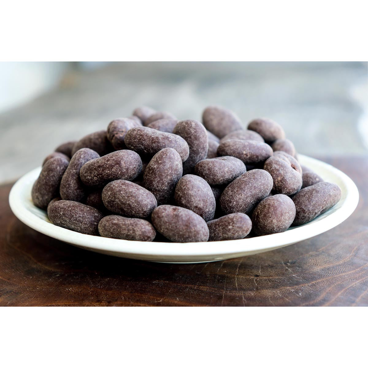 60% Chocolate Covered Almonds in a bowl 